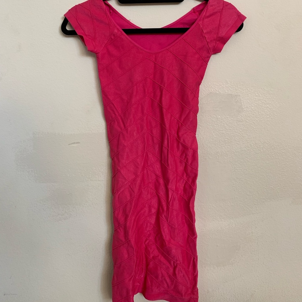 BEBE Pink body con dress with back cut out